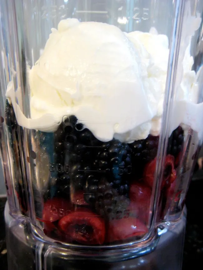 blackberries, cherries, and yogurt in the blender