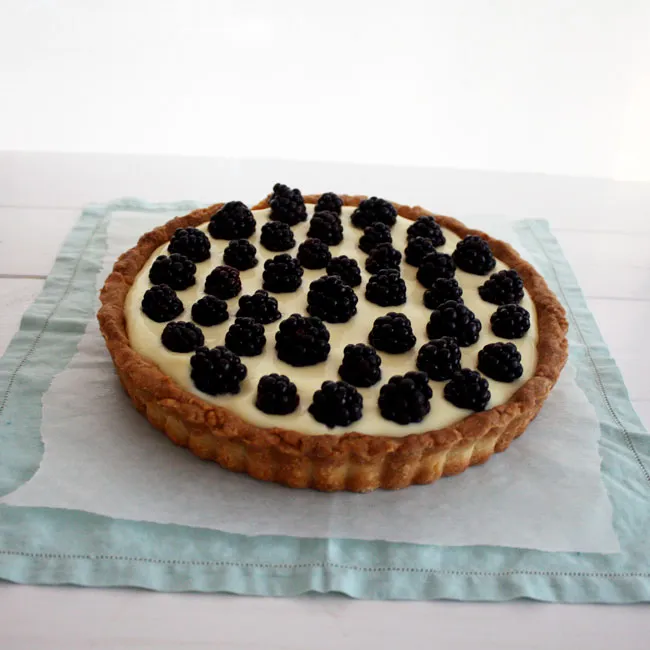 lime curd and fresh blackberries in a shortbread crust