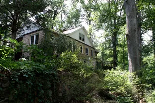 a view of the house from the creek