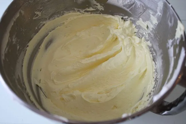 a bowl of mango buttercream