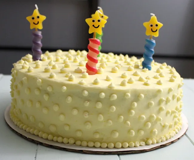 coconut mango cake with fresh strawberries