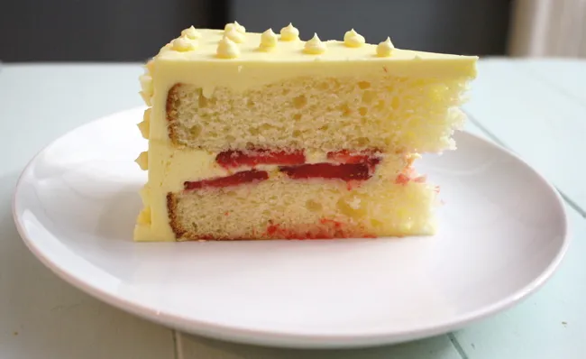 coconut mango cake with fresh strawberries