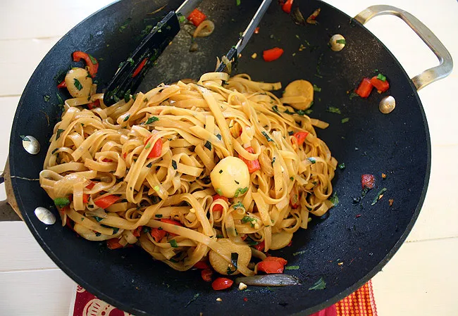 spicy basil noodles in the pan